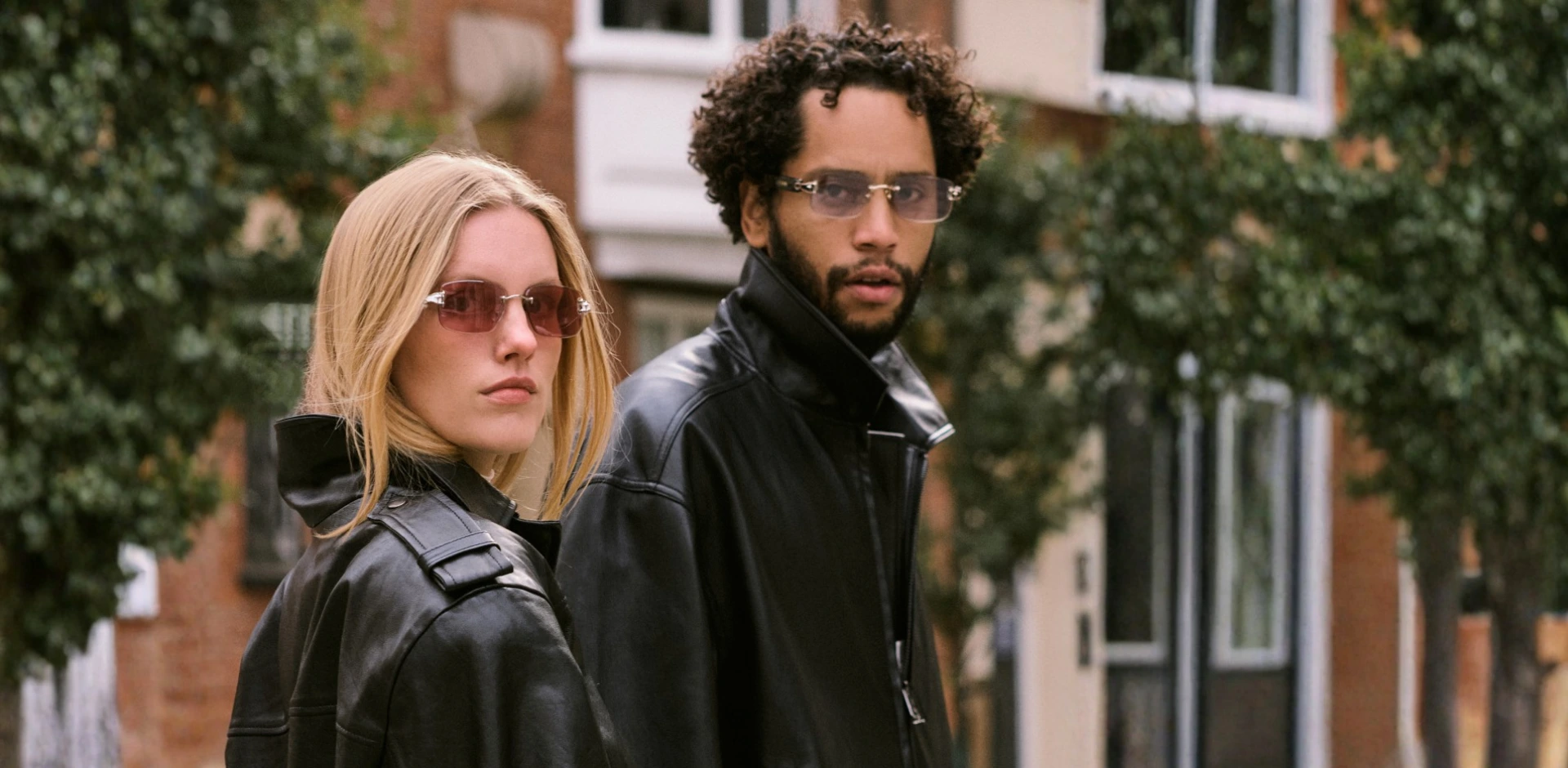 Woman and man wearing CHAMELO sunglasses